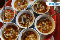 Du khách tham gia tour du lịch Hà Giang 4 ngày 3 đêm check-in tại Cột Cờ Lũng Cú – cực Bắc Tổ quốc.